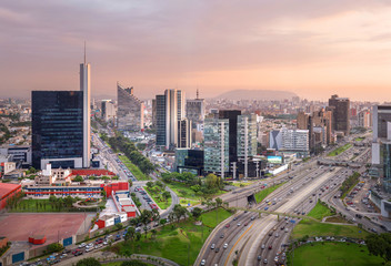 Lima, Peru: view of San Isidro  at Sunset. - obrazy, fototapety, plakaty