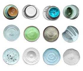 Set with beautiful ceramic dishware on white background