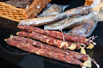 smoked sausage and meat in a plastic package