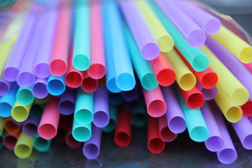 straw straws plastic drinking straw background colourful  full screen single use pollution disposable straw beverage stock photo photograph image picture - obrazy, fototapety, plakaty