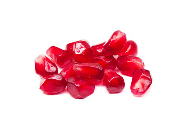 Juicy pomegranate seeds isolated on white background