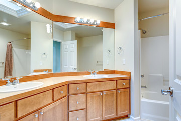 Photo of bathroom with double vanity cabinet.