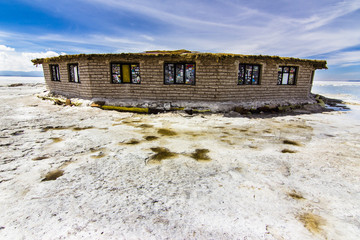 Uyuni reflections are one of the most amazing things that a photographer can see. Here we can see how the sunrise over an infinite horizon with the Uyuni salt flats making a wonderful mirror. 