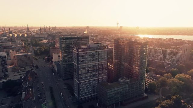 Aerial view of Hamburg (Germany). Cityscape and big modern buildings at sunset. A sunset Aerial shot of skyscrapers of Hamburg Business Centre.