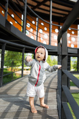 Portrait of little Asian baby boy at outdoor park