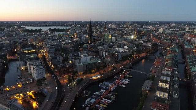 Aerial view of Speicherstadt Hamburg, Germany. Sunset / dusk / night. City lit up at night, Hamburg, Germany Night city landscape. Amazing architecture.