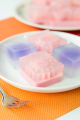 Colorful jelly dessert sweets served in plate