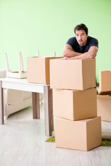 Man moving house with boxes