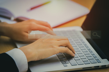 Woman hands searching browsing internet data information networking, close up.