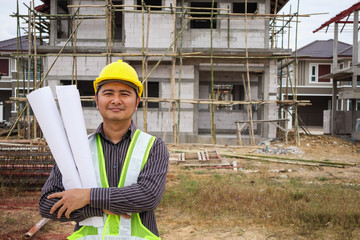 Asian business man construction engineer worker at house building site