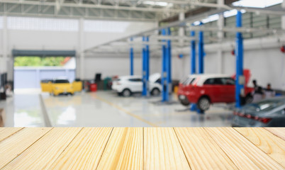 car service centre with auto at repair station bokeh light defocused blur background