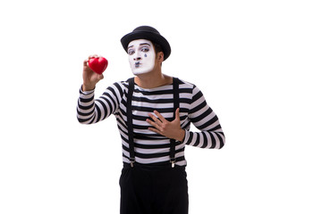 Mime holding red heart isolated on white background 