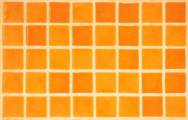 Orange Tiles on the wall.