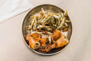 Traditional chinese marinaded squid and small fish
