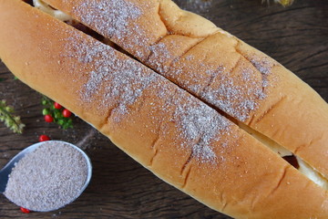 fresh tasty homemade bread on old wooden