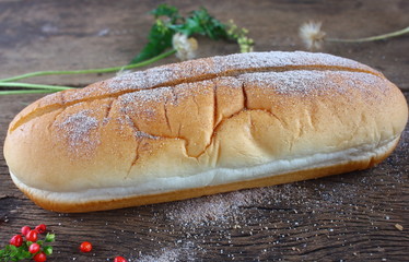 fresh tasty homemade bread on old wooden