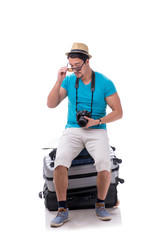 Traveler with much luggage isolated on white background