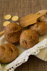 breads home made browns colors with spoons and napkins 