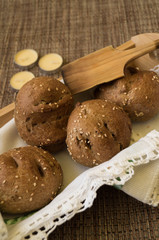 breads home made browns colors with spoons and napkins 
