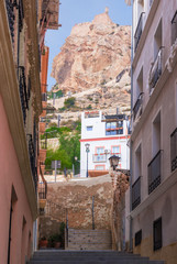 narrow lanes with long staircases leading to the castle in the oldest part of Alicante, Spain