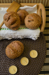 breads home made browns colors with spoons and napkins 