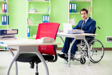 Disabled businessman working in the office