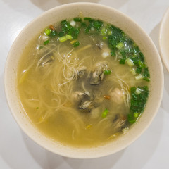 Oyster noodles soup with green onion - 214413592