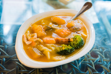 Chinese style gnocchi with broccoli, carrots, and shrimp - 214415916