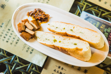 Traditional Chinese dessert with fish and tofu - 214415975