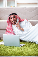 Arab man working at home on his work