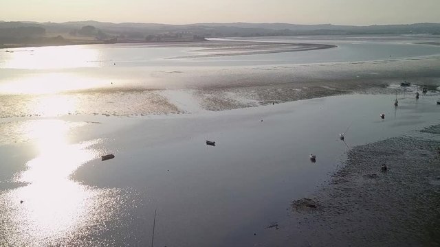 Aerial view of the harbour, coastal landscape of Lympstone during sunset. The town is located in East Devon in South East England.