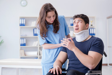 Man with neck injury visiting doctor for check-up