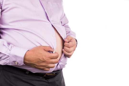 Man with unhealthy big belly unbutton tight shirt to relief