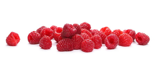 pile raspberries isolated on white