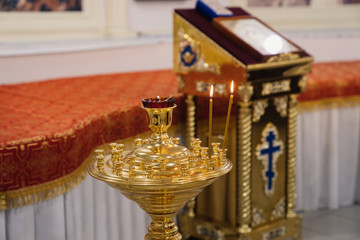 lit candles in the Christian church