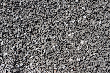 Background of fine wet crushed rock, crushed
