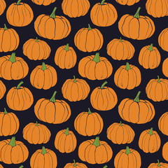 Pumpkins pattern. Autumn seamless vector pattern with hand drawn pumpkins on dark background.