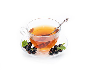 tea with black currant on white background