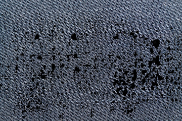 Grunge dirty Blue denim macro texture with seam for jeans background