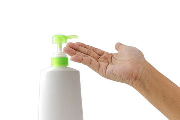 Hand of woman is using for the liquid from the green pump bottle