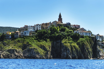 Fototapeta na wymiar Small fishing town (950 inhabitants), spread stepwise on a limestone slope above the sea.