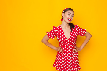 Portrait of a funny emotional young woman. Pin-up style.