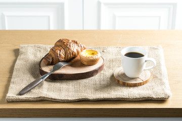 Breakfast prepared with delicious breads and prepared meal