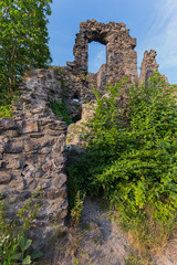 Fototapeta na wymiar the remains of majestic stone walls of the Nevytsky castle on the mountain near Uzhgorod
