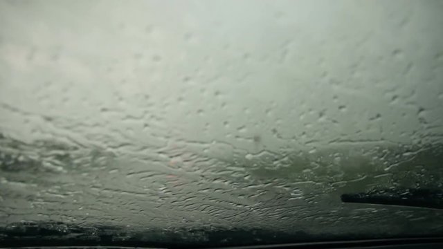 View from inside the car during heavy rain.