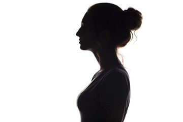silhouette profile of beautiful girl on a white isolated background