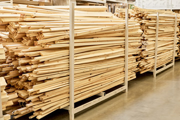 Many wooden planks in hardware store