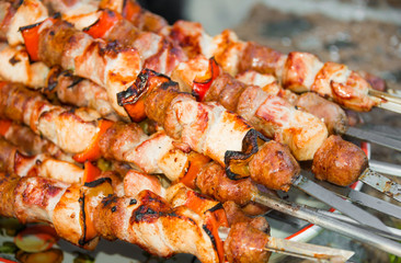 Meat on sticks grilled outdoors