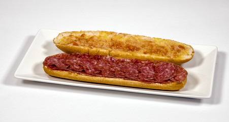 pa amb tomaquet amb fuet, bread with tomato and a typical sausage of Catalonia