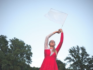 Teen Majorette Girl with White Flag